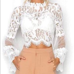 White crop top by Sonja Morgan!